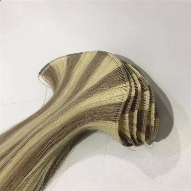 Piano-hand-tied-weft-hair-extension (1).webp